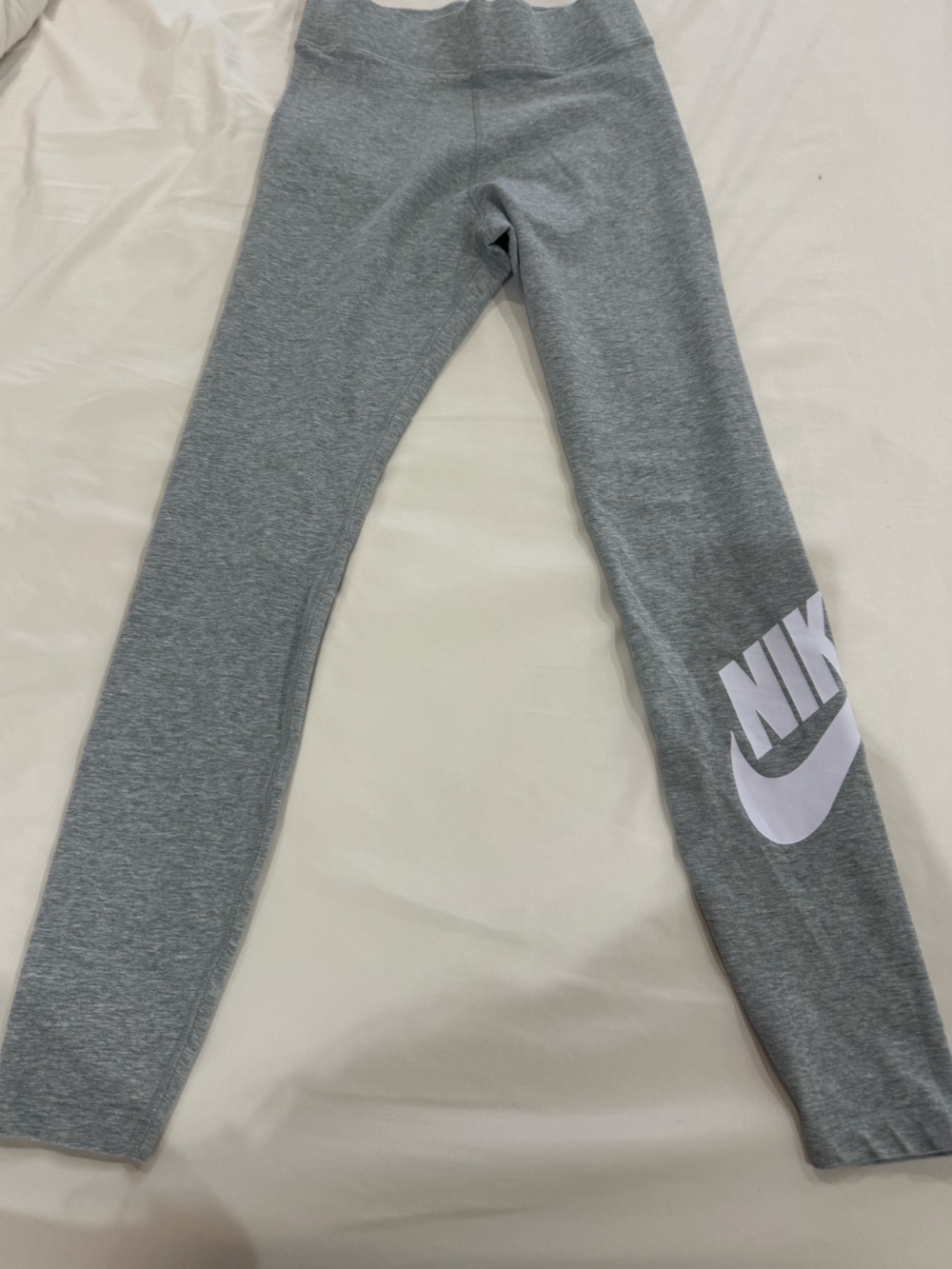 Nike Gray Leggings with White Swoosh Logo